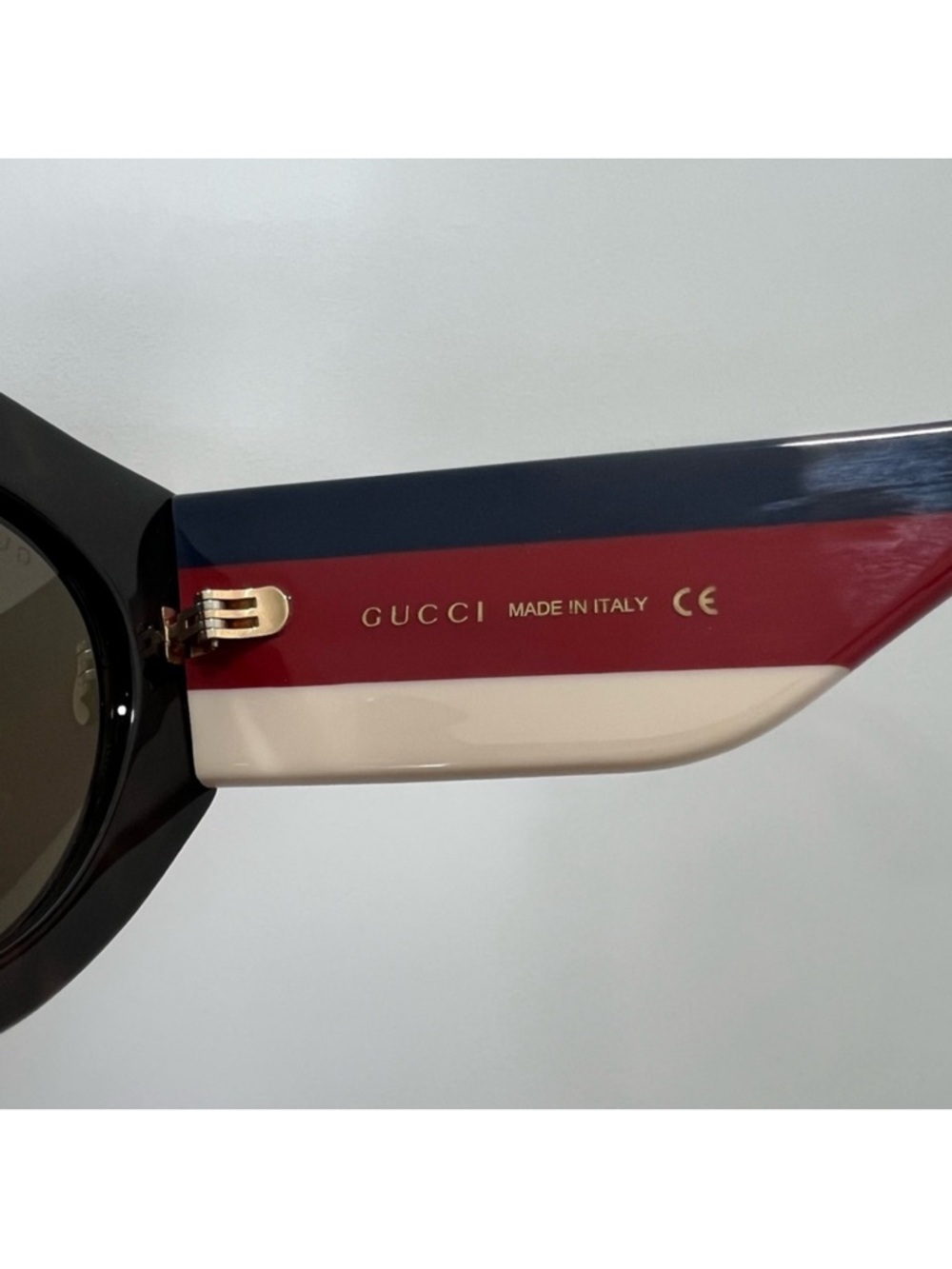 Gucci Black Cat-Eye Sunglasses with Navy and Red Striped Temples - Picture 6 of 10